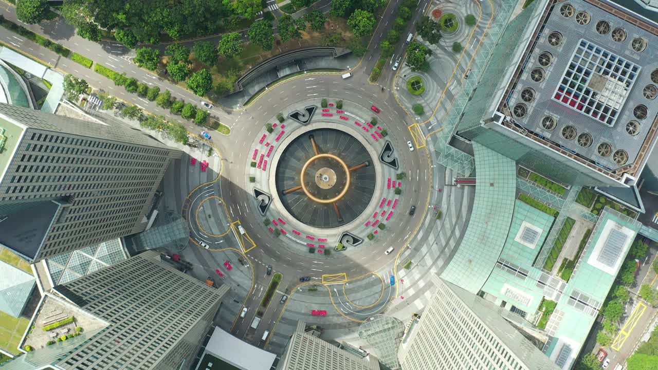 hora del día ciudad de singapur edificios famosos del centro del tráfico círculo cuadrado panorama aéreo 4k