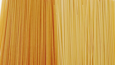 Raw-spaghetti-on-white-background