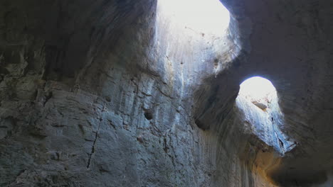 divine light in bulgaria: the eyes of god (oknata) in prohodna - cinematic shots