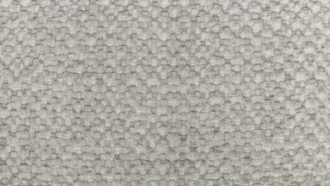 slow zoom in on grey fluffy wool upholstery fabric texture