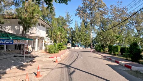 a vehicle's journey down a serene road