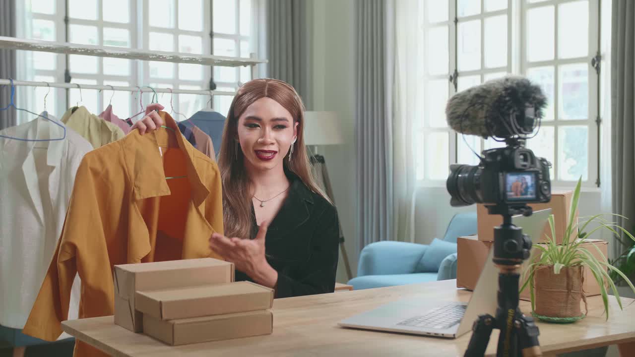 Young Asian Transgender Woman Selling Clothes Online By Live Streaming. Selling It Online Live Streaming Concept