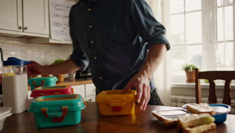 father preparing lunch for his child