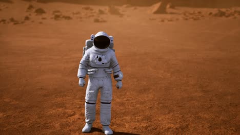 astronaut on mars surface. red planet covered in gas and rock