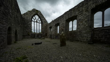 panorama motion time lapse of creevelea abbey medieval ruin in county leitrim in ireland as a historical sightseeing landmark and graveyard with dramatic clouds in the sky