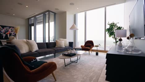 wide shot of a modern living room with distinctive furniture and unique style