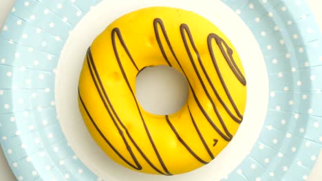 el donut está vidriado de cerca, con un bucle sin costuras.