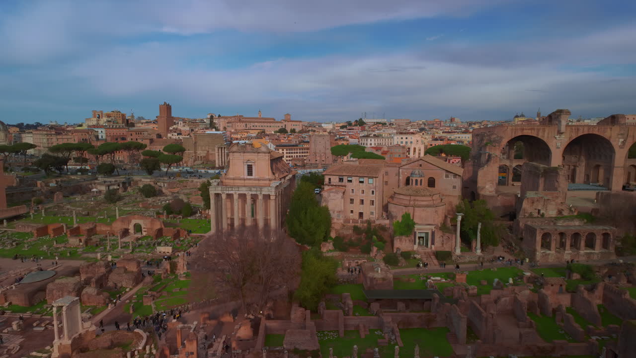 Tilting up to reveal the ruins of the Roman Forum, Rome, Italy