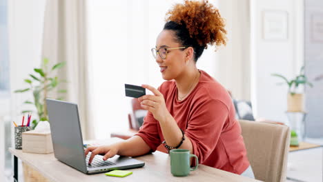 laptop, credit card and black woman typing