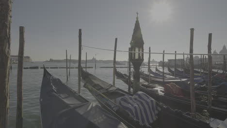 gondolas at venice canal on a sunny day