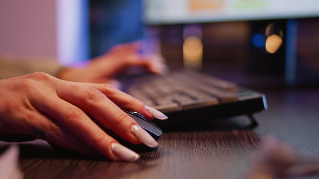 Close-up of hands using computer