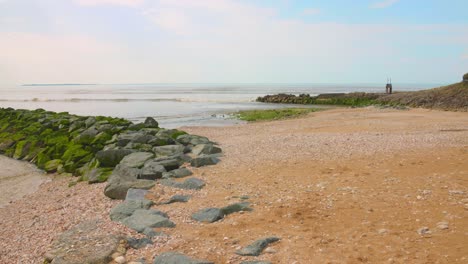 pan shot of the beach and sea in angoulins, france.