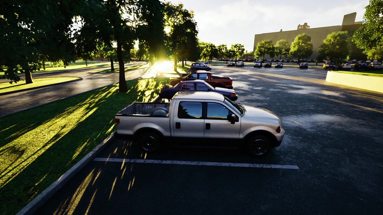 Solnedgang kaster varmt skær over en robust pickup-truck parkeret nær forstadshorisonten