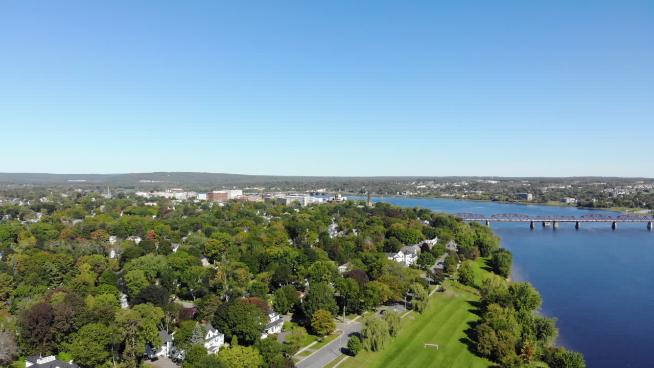 AERIAL: Slow Rising Shot Over The City of Fredericton and Saint John River