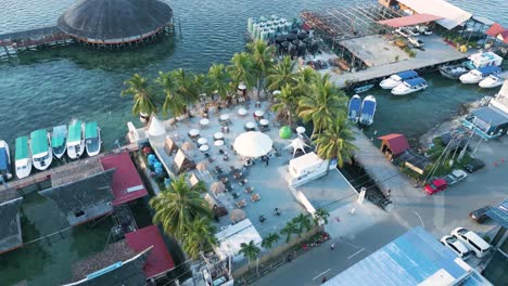 harbour-cafe,-beach-club-with-palm-trees-terrace-in-Semporna,-Sabah,-Seafest-village