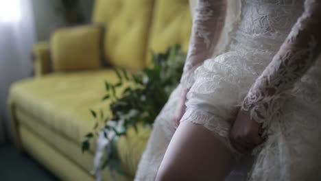 bride getting ready in a wedding dress