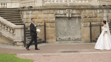 bride and groom posing for photos at their wedding