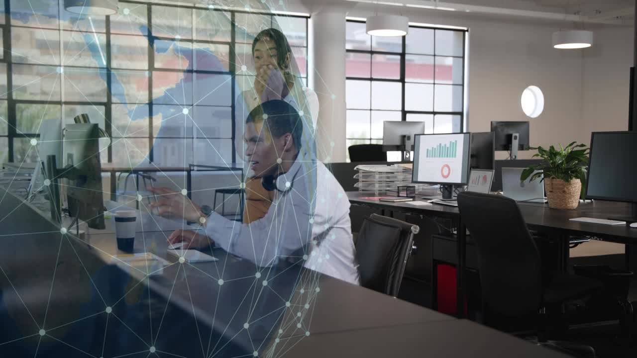 Digital globe sweeping from left initiating business review as woman joining man pointing at chart