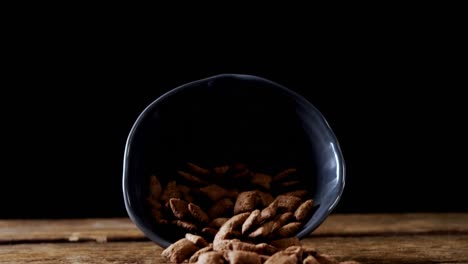 Chocolate-toast-crunch-spilling-out-of-bowl-4k