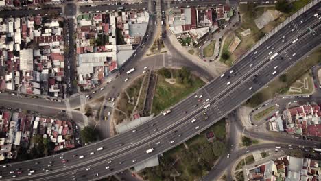 Aerial-top-down-shot-of-traffic-on-highway-and-roundabout-in-Buenos-Aires,time-lapse