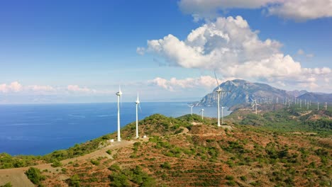 Scenic-landscape-with-wind-power-generators-on-the-mountain-ridge-in-South-Western-region-of-Turkey,-Reşadiye-peninsula