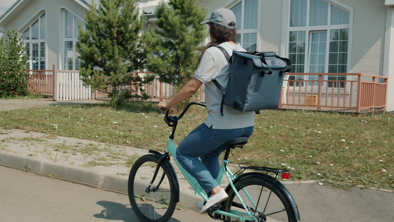 Woman delivering on a bicycle
