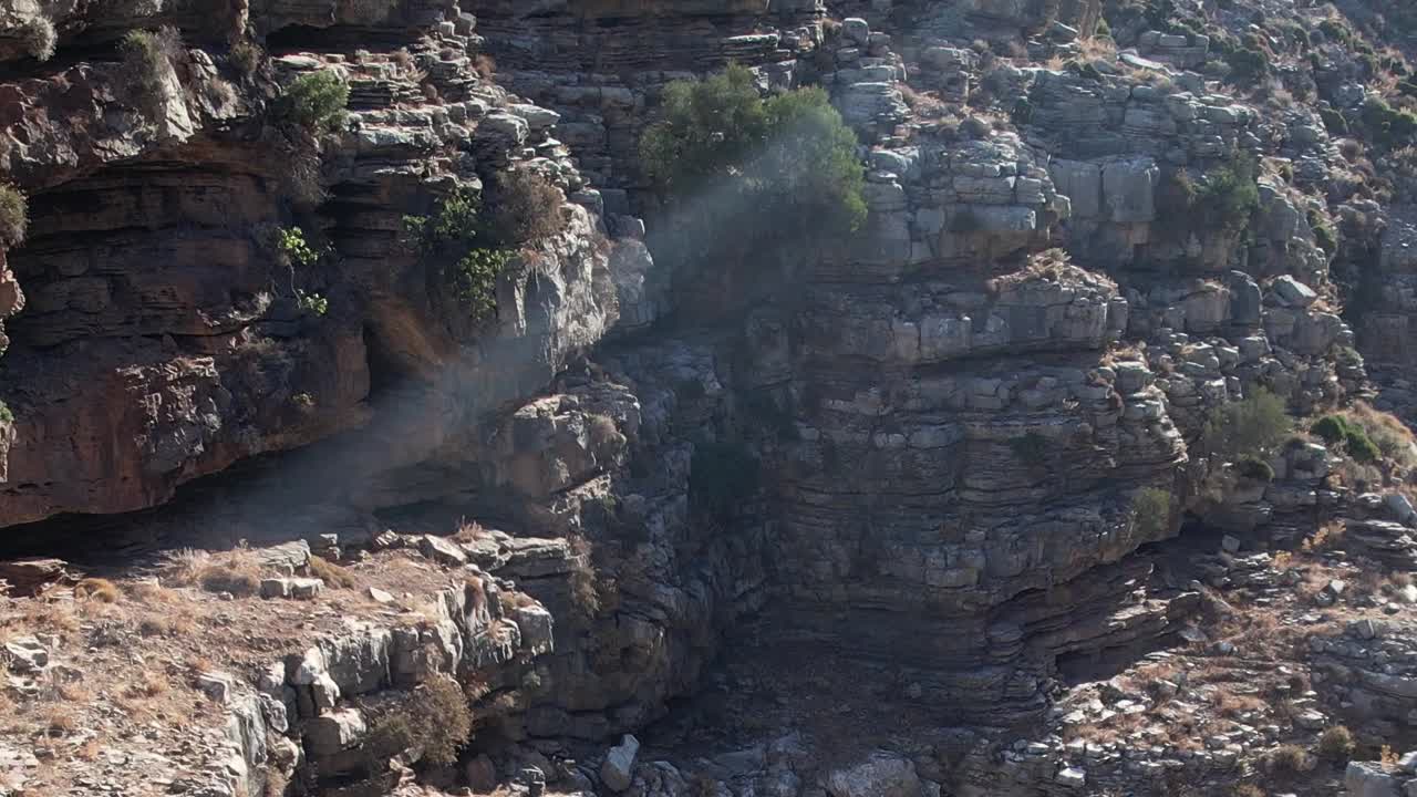 Explore the rugged cliffs and natural beauty of Greece from above