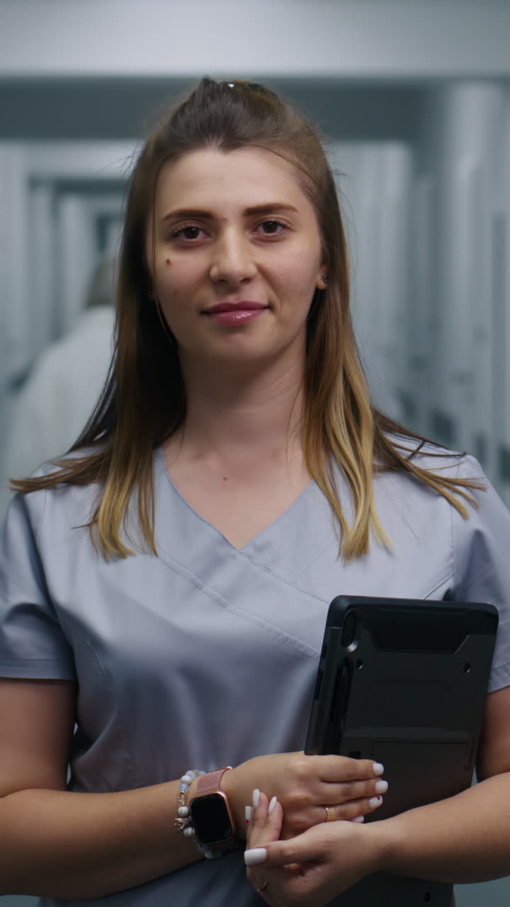 Female doctor stands in modern clinic corridor loo 4k 2025 08 04 22 58 20 utc.mov | assistance, care, caucasian, clinic