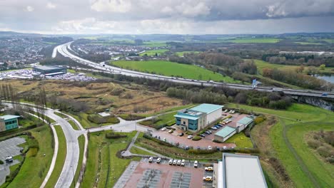 Aerial-cinematic-footage-of-commercial-complex,-trading-estates-in-the-city-of-Wakefield