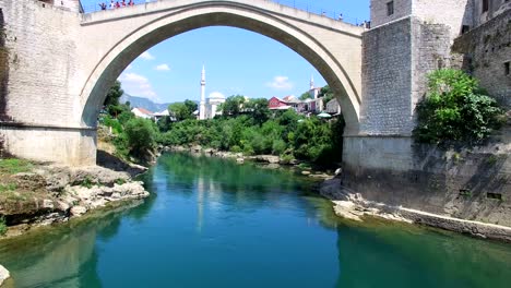 flying towards famous bridge in mostar, bosnia and herzegovina