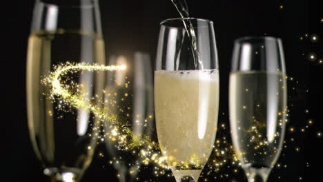 animation of moving lens flare over champagne glasses and champagne getting poured in empty glass