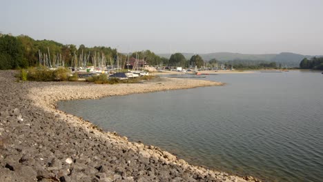 Wide-shot-Looking-west-on-Carsington-water-dam-to-Carsington-sailing-club