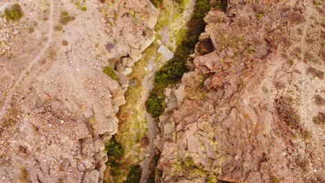 Top-down-aerial-drone-shot-of-rock-formations-in-Canary-islands,-Tenerife