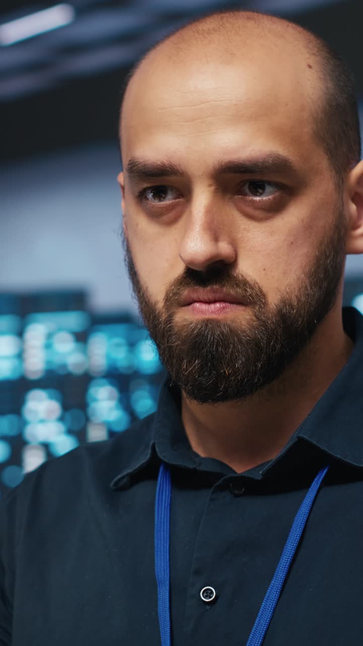 Focused IT Engineer Working in a Data Center