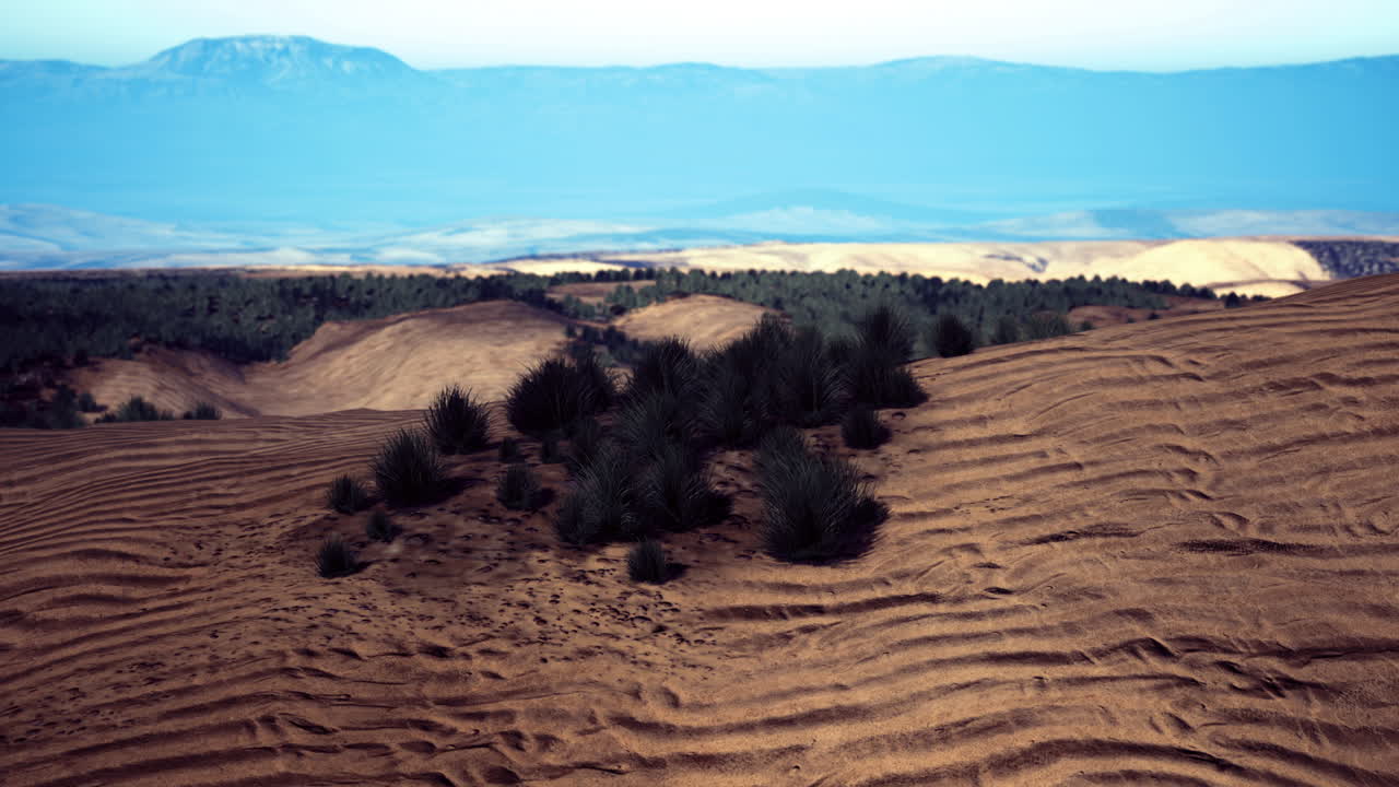 Vast landscape with rolling hills and distant mountains in peaceful setting