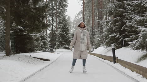 woman ice skating in snowy park