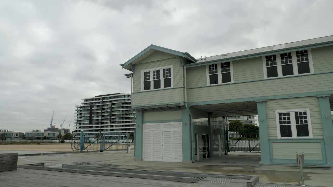 Green Wooden Building on the Beach