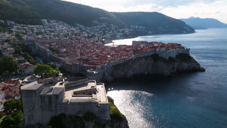 dubrovnik old town and city walls from fort lovrijenac in dalmatia, croatia. - aerial shot