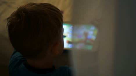 little boy using tablet computer