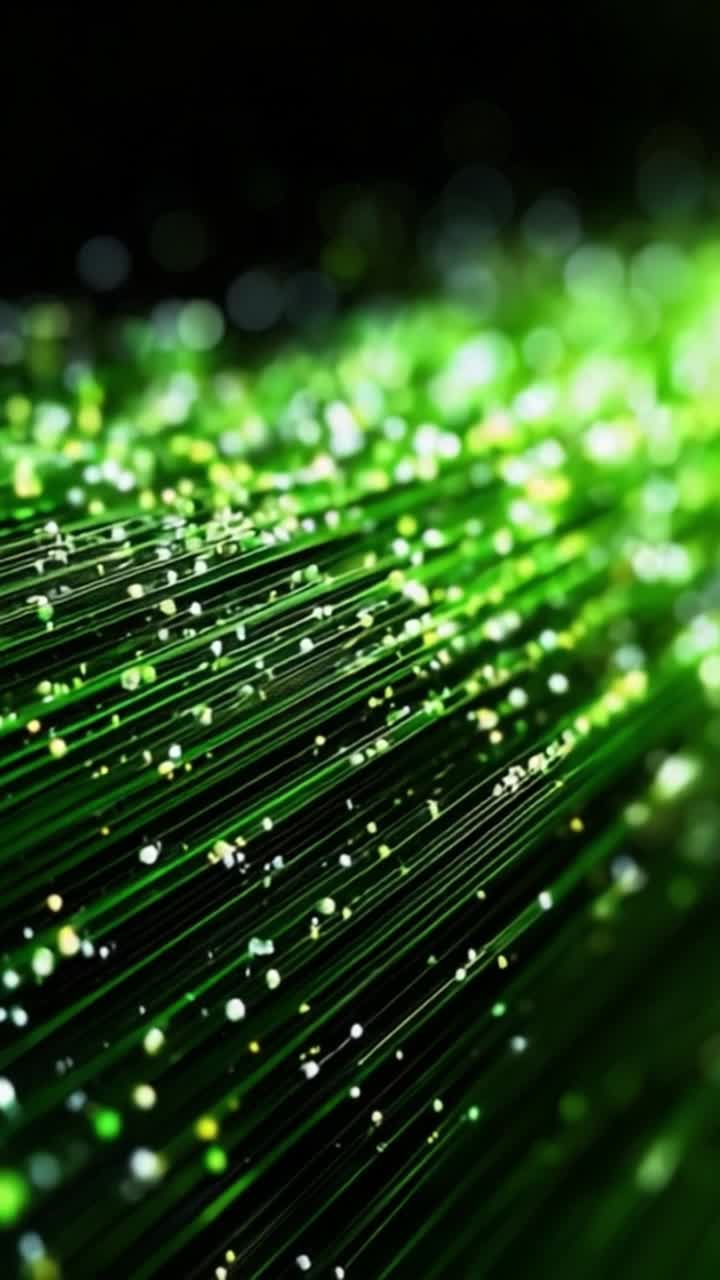 A mesmerizing display of shimmering green light particles cascading across a dark background, creating an ethereal ambiance of vibrant energy and visual delight