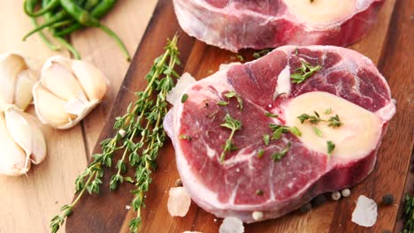 raw beef short ribs with herbs and spices