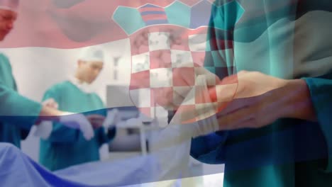 Animation-of-flag-of-croatia-waving-over-surgeons-in-operating-theatre