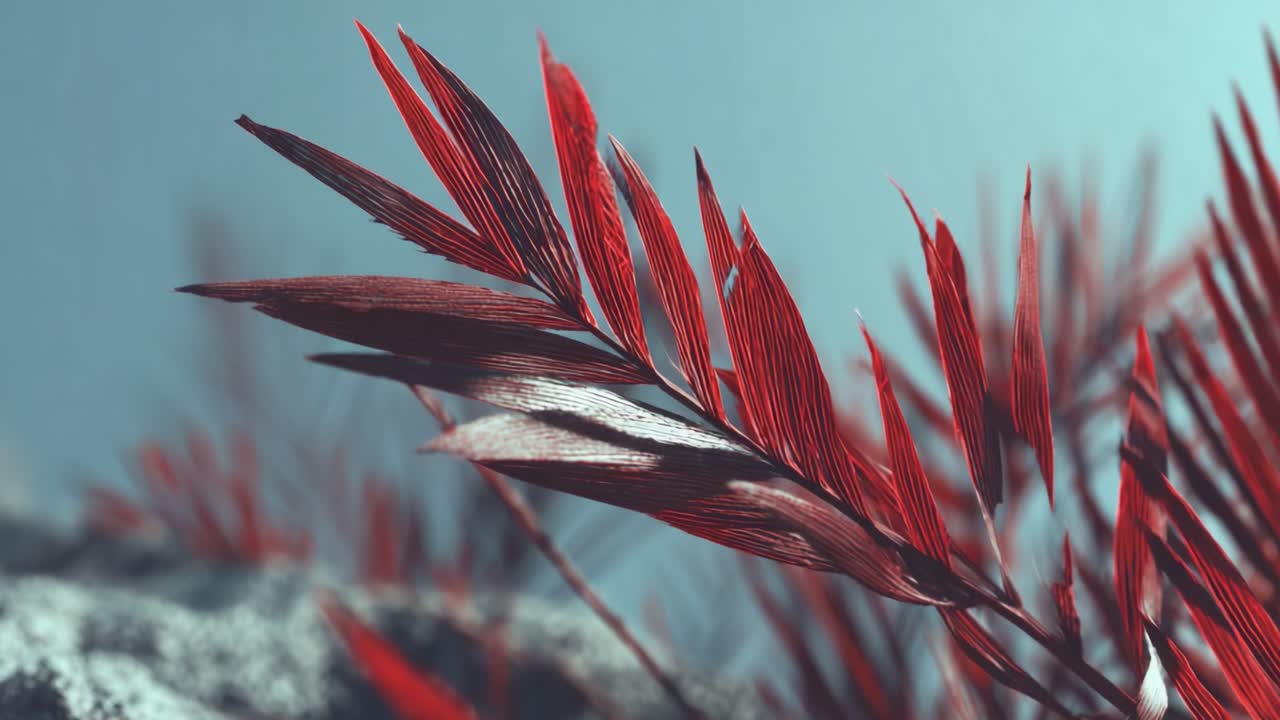 An Artistic Close-Up of Striking Red Leaves Against a Soft Blue Background, Capturing the Intricacies of Nature's Palette in a Stunning Display of Color and Texture