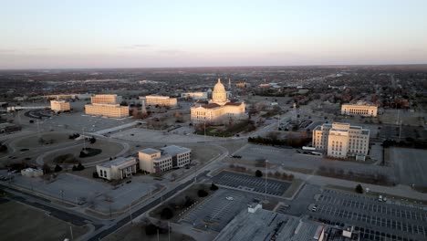 oklahoma state capitol building in oklahoma city, oklahoma with drone video moving down at an angle