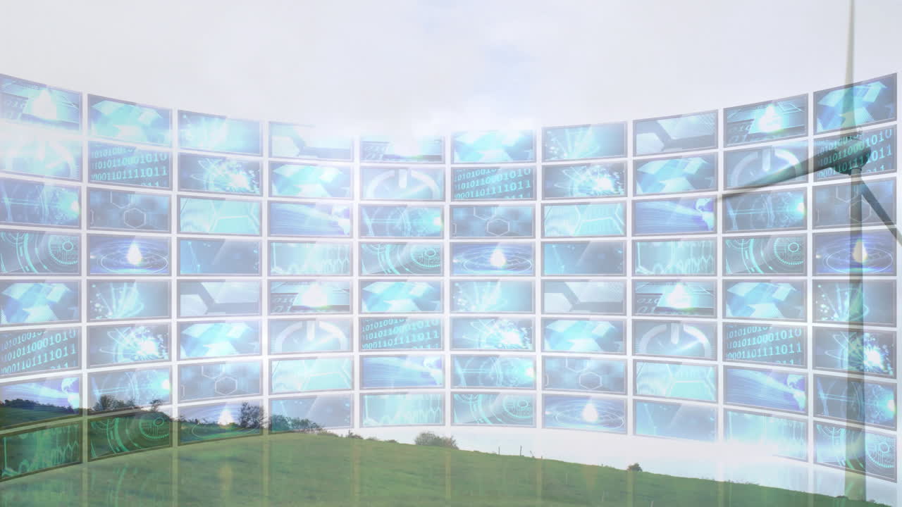 Digital screens showing data animation over green landscape with wind turbine
