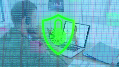 Animation-of-biometric-fingerprint-with-shield-over-caucasian-man-using-phone-headset-and-laptop