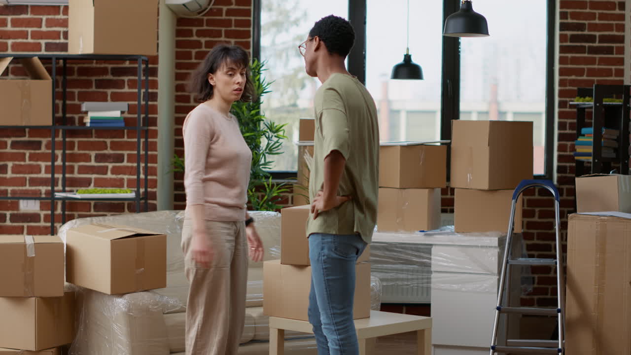 Multiethnic partners buying apartment on loan together