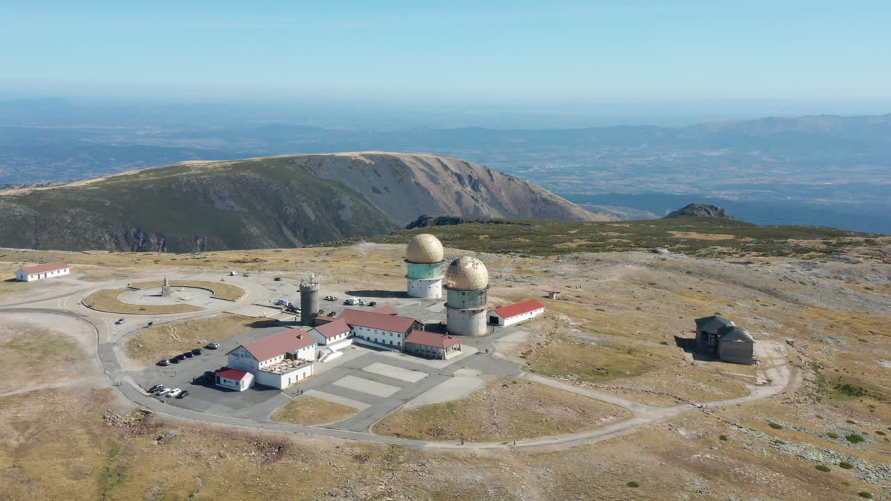 Aerial shot orbiting over Serra da Estrela Tower Observatory, Portugal