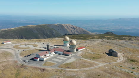 aerial shot orbiting over serra da estrela tower observatory, portugal