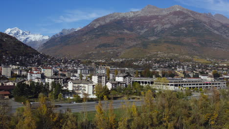 a city of dreams the valle d’aosta, with the amazing transportation view by heavy trawlers, northern italy, a drone view